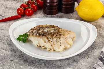 Baked cod fish fillet with spices