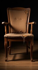 An old wooden chair sits with a shattered leg and ripped upholstery, indicating neglect and a need for immediate repair or disposal. (137 characters) ,old ,unusable ,ruined
