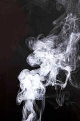 white smoke spread black background