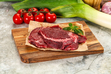 Raw beef cheeks cut for cooking
