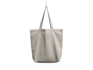 Beige cotton tote bag hanging isolated on transparent background, a versatile and ecofriendly option for shopping, carrying books, or everyday use, promoting sustainability