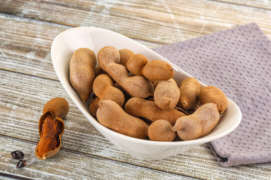 Tropical exotic Tamarind fruit heap