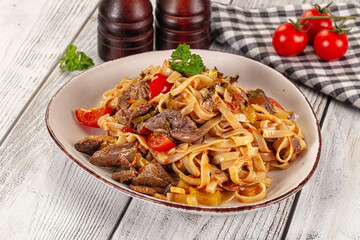 Asian udon noodles with beef