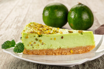 Green pistachio cheesecake served mint