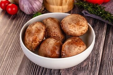 Raw brown champignon heap for cooking