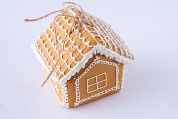 Gingerbread House Cookie on white background. Christmas tree sweet food decoration