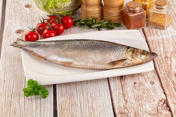 Raw whole salted herring fish
