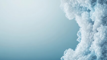 Microscopic view of crystalline cellular structures forming in a pale blue laboratory fluid, abstract biological background.