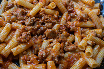 Pasta with sauce, sausage and mushrooms is a very tasty and flavourful first course, substantial and rich even if it requires few ingredients, a dish that can be a first course or a single dish