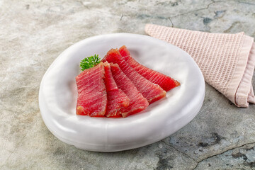 Raw red tuna sashimi slices