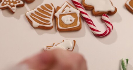 Get into the holiday spirit by making traditional gingerbread cookies. Watch as we decorate festive shapes in a cozy kitchen setting. Perfect for family celebrations and gatherings.