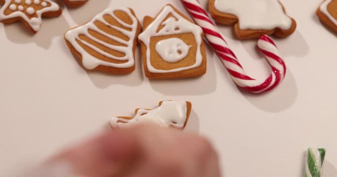 Get into the holiday spirit by making traditional gingerbread cookies. Watch as we decorate festive shapes in a cozy kitchen setting. Perfect for family celebrations and gatherings.