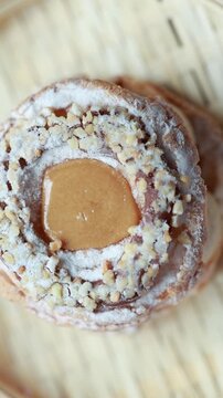 Close-Up of Pistachio and Pumpkin Christmas Paris-Brest Dessert