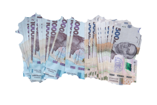 Stack of torn Ukrainian hryvnia banknotes, including 1000 and 500 bills, isolated on transparent background as a symbol of inflation.