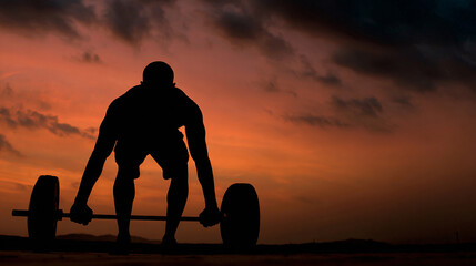 Man deadlifting at sunset, showing strength, fitness, and determination