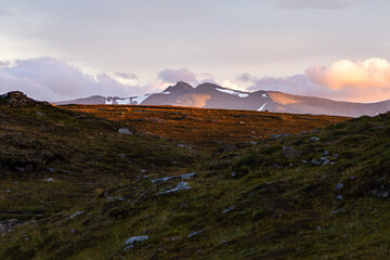 Sunset golden hour light Sylarna mountain peaks Sweden hiking backpacking trail