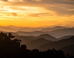 Obraz premium Breathtaking Sunset over Mountainous Landscape