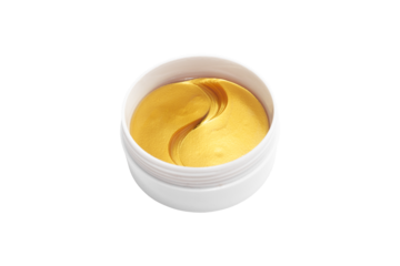 Gold hydrogel eye patches on white background.
