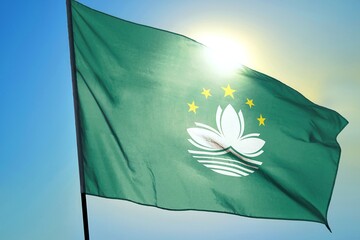 Macau flag on sunny sky background
