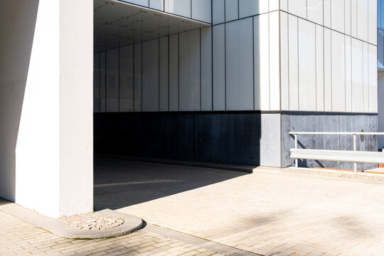 Contemporary urban architecture structure with concrete design and geometry creating a minimal facade texture and soft modern daylight atmosphere