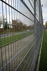 Obraz premium close up of metal fence grid 