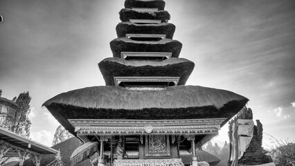 Scenic view of Pura Ulun Danu Beratan Bedugul temple surrounded by lake and misty highlands in Bali
