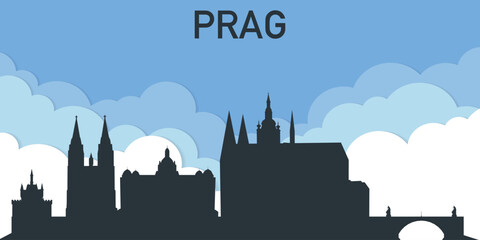 Fototapeta premium Silhouette of Prague skyline against a blue sky with clouds.
