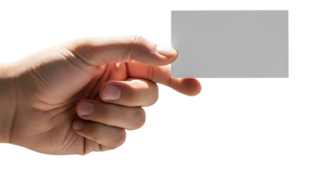 A hand holding a gray card with fingers visible against a black and white background in a studio shot