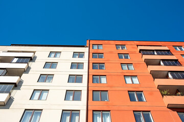 Modern urban architecture facade featuring geometry and minimal symmetry within a clean structure pattern and design reflecting the balanced daylight atmosphere of contemporary buildings