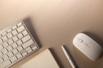Office desk table with computer, supplies and coffee cup. Top view with copy space