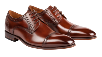 Brown leather pair of shoes isolated on white background or transparent png, stylish classic footwear with polished finish for formal or casual wear.