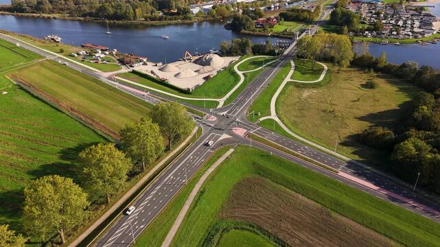 Aerial view of traffic at a rural intersection near a river