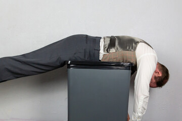 Vintage Businessman Tossed onto Trash Can. Concept of Being Sacked or Fired. Stock Market Crash.