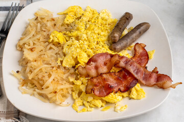 scramble eggs  with bacon  and sausage