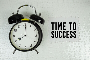Time To Success text with alarm clock on white background