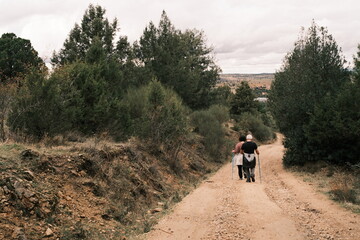 Walking on a rural path surrounded by nature
