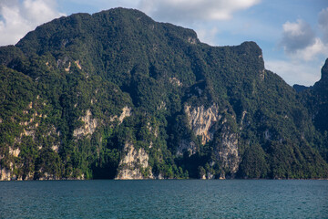 Aerial view of stunning limestone cliffs and lush greenery in khao sok national park, thailand