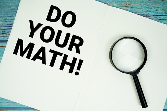 Do Your Math text written on notepad with magnifying glass flat lay on wooden background