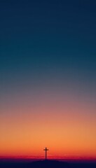 Minimalist Silhouette of Cross Against Vibrant Sunset Sky
