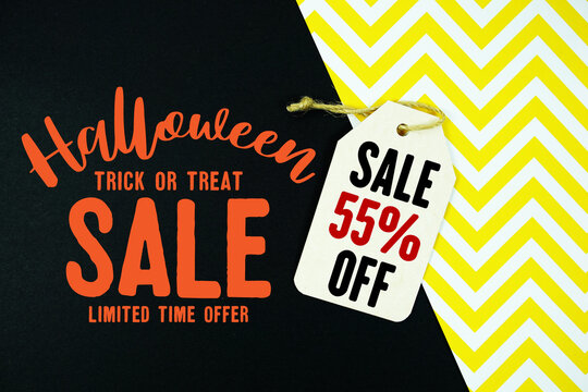 Halloween sale graphic and Gift tag offering 55% off with twine resting on black and yellow chevron background for seasonal promotions and retail marketing.