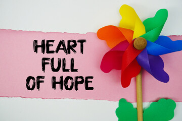 Heart Full of Hope  motivational and inspirational quotes message on pink background