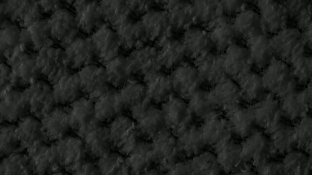 black braided material with an interesting pattern