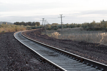 Railway tracks at sunset. New infrastructure for train traffic