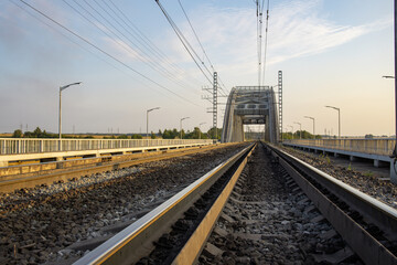 Train track with a bridge over it