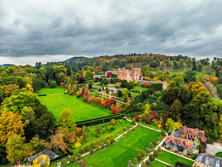 Autumn colours over Powis Castle and Garden from drone, Welshpool, Powys, Wales, England