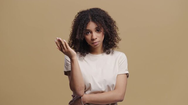 Worried Confused African Teenage Girl, No, Forgot. Girl Feeling Sorrow, Regret, Failure. Bad memory, beige studio