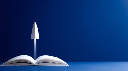 An open book with a paper plane flying upward. This image symbolizes imagination and creativity. It represents inspiration and the journey of learning. Ideal for education or motivational themes. AI