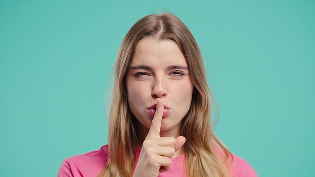 Beautiful Woman Makes Shush Shh Gesture With Finger On Lips, Silence Signaling 