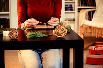 woman wrapping christmas presents