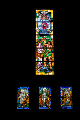 Blois, France - 10 27 2025: Detail view of stained glass window inside Basilica of Our Lady of the...